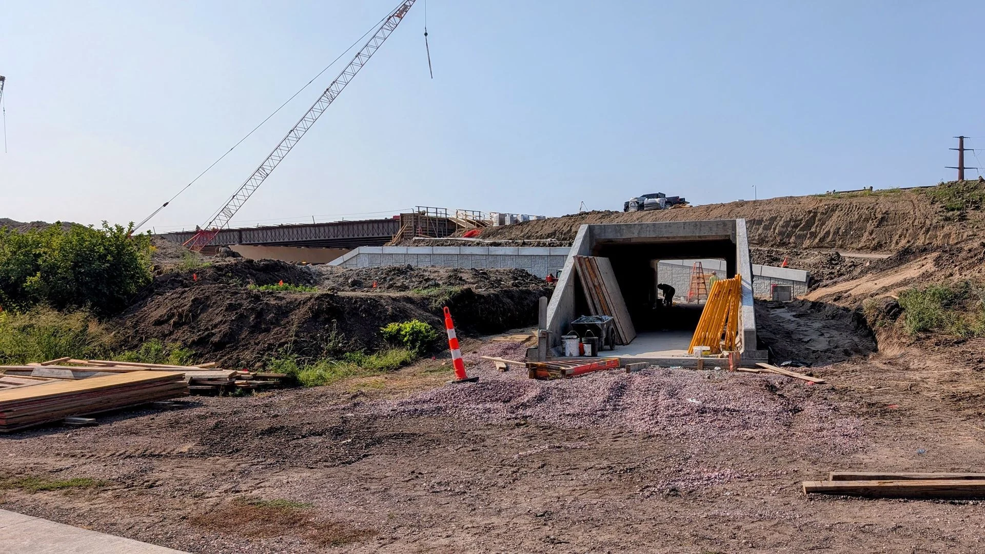 New bicycle and pedestrian trail connection tunnel being installed under I-229 at the Cliff Ave interchange.